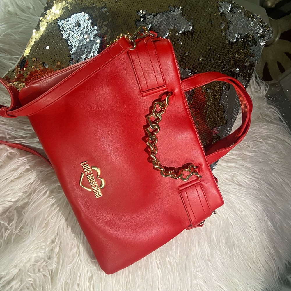 Red and gold Moscchino bag